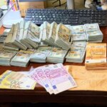 Елітні авто, швейцарські годинники, 22 млн готівки: ОГП показав, що вилучили в топчинів поліції
